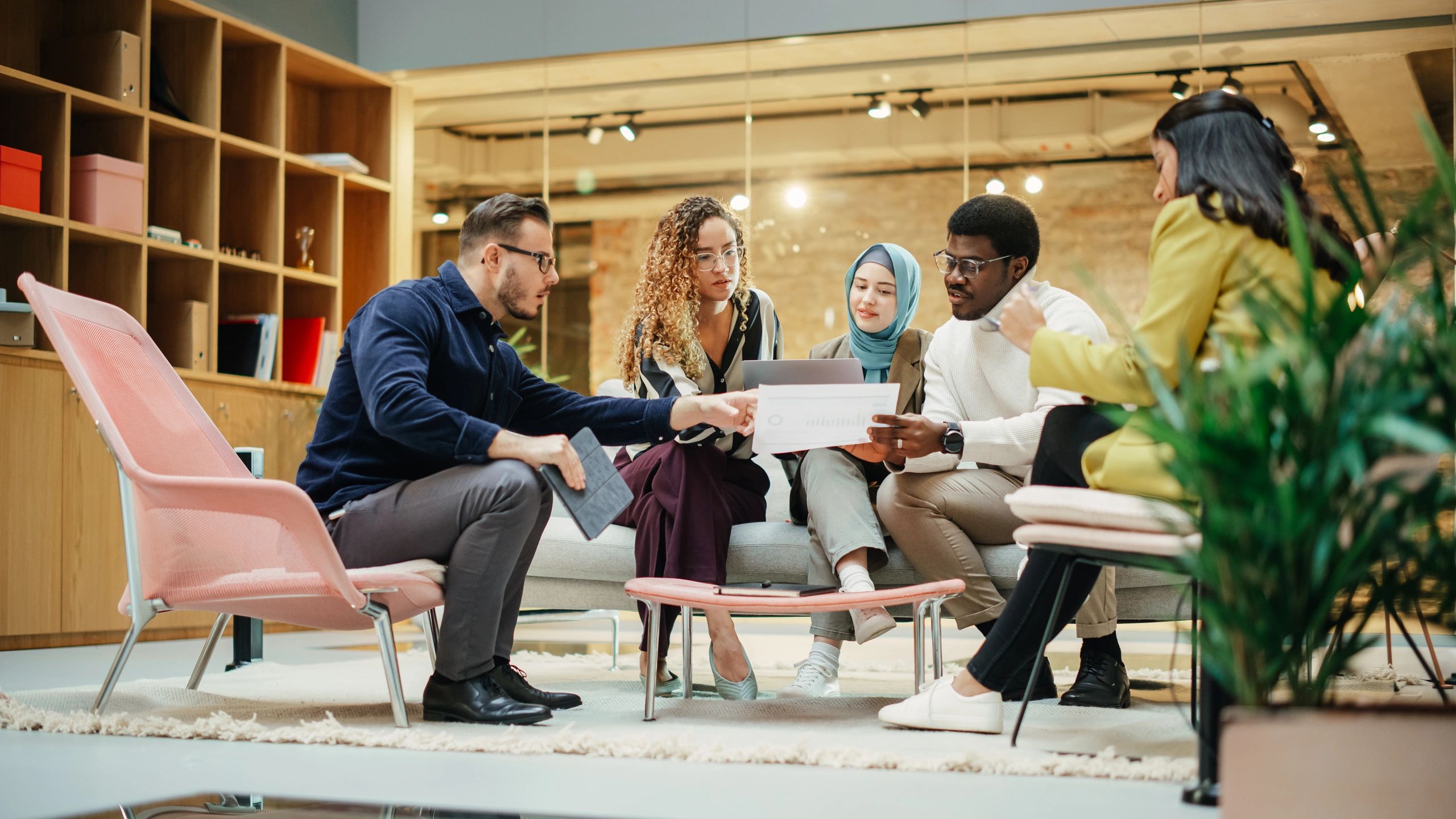Team preparing a presentation in a conference room