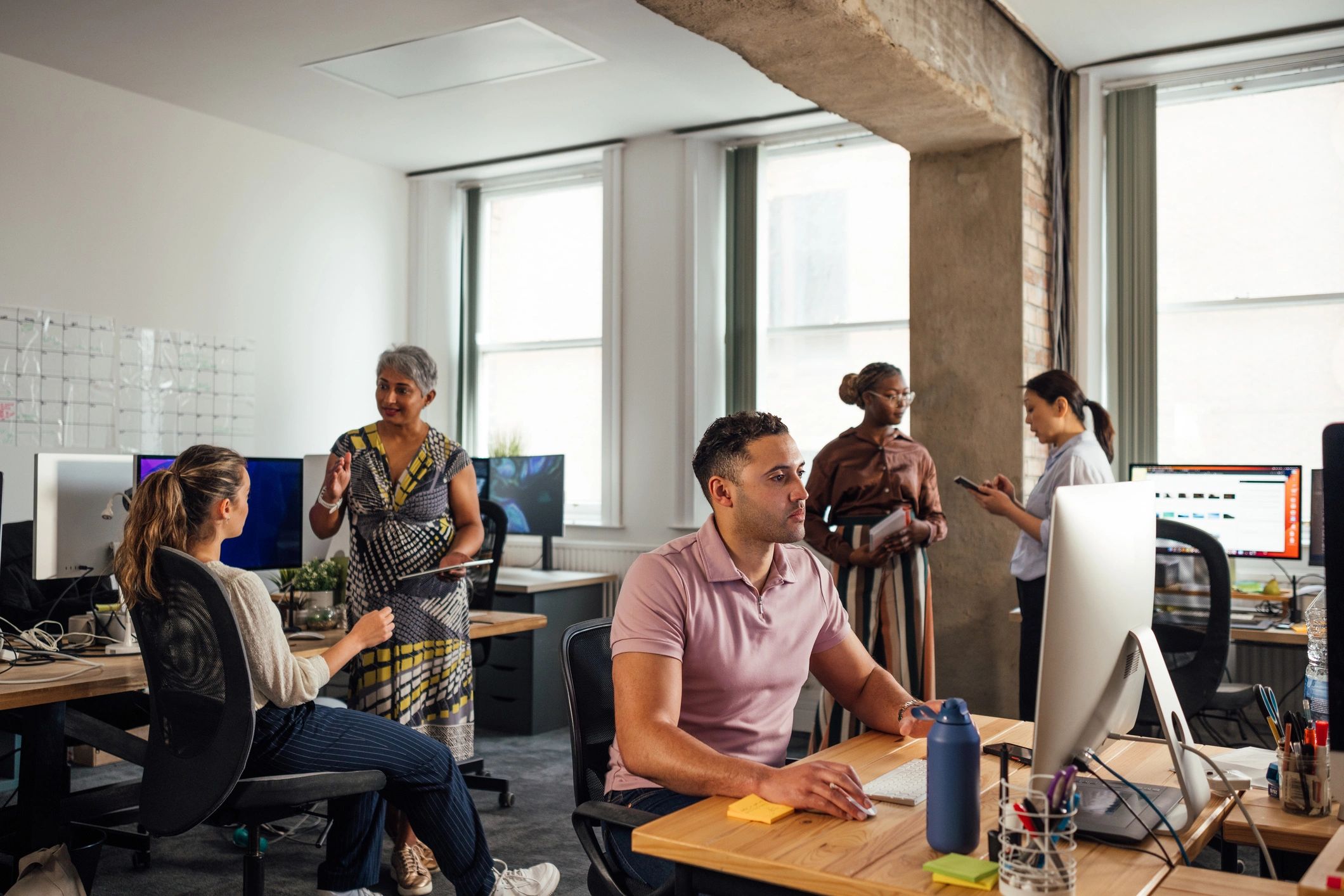 Office team working together in a professional setting