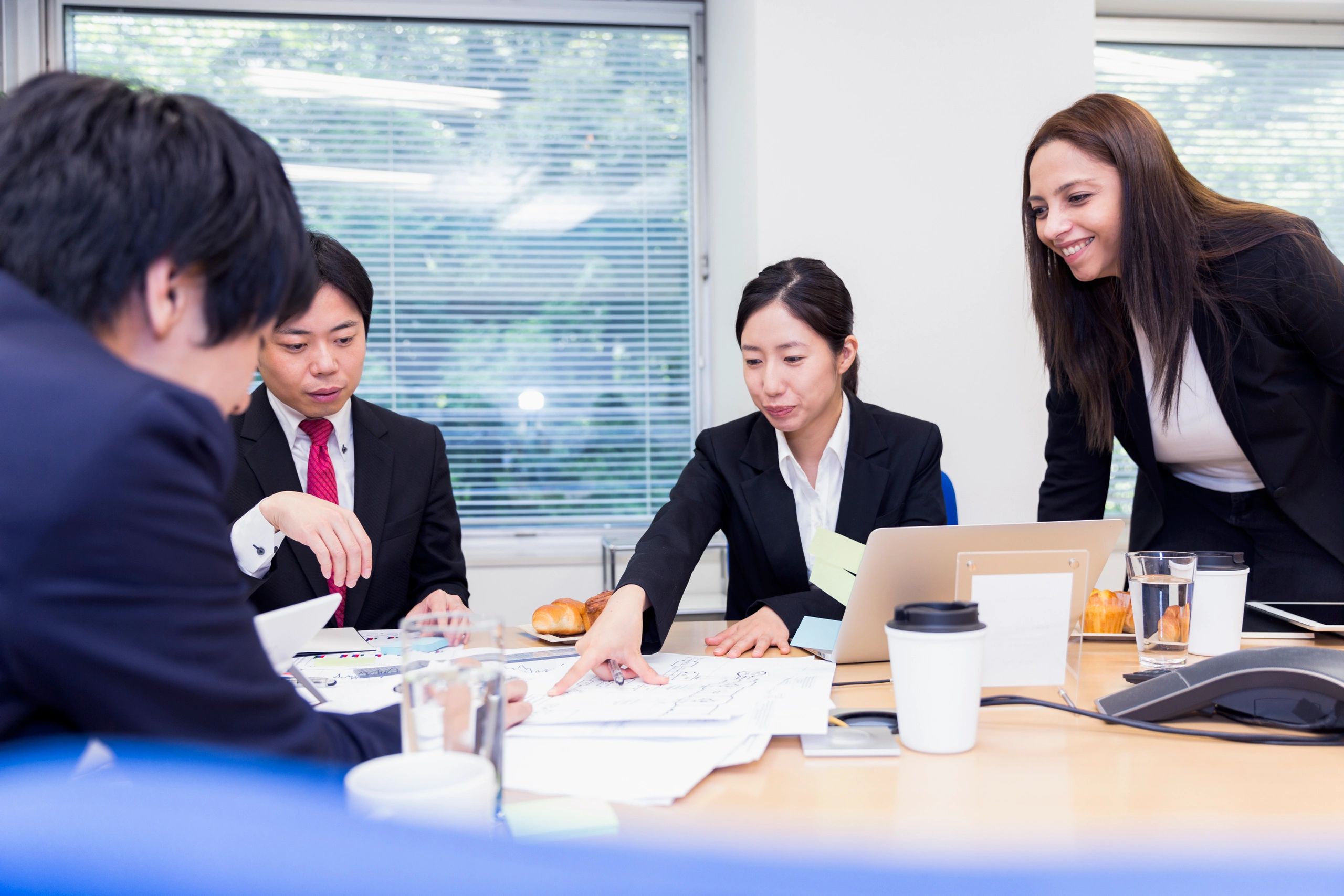 Group of business professionals preparing for a conference